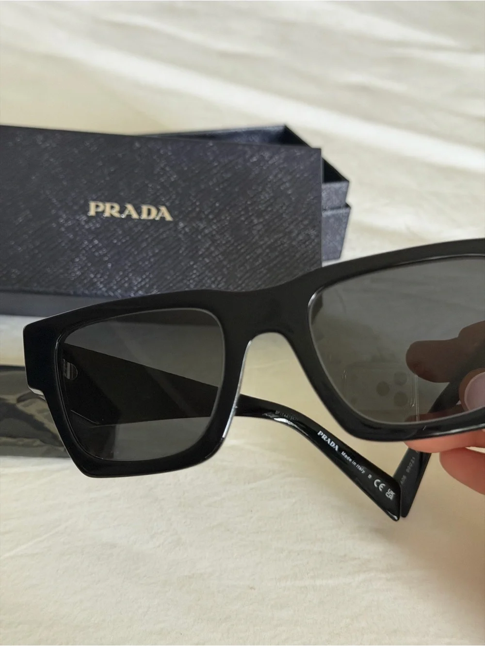 Prada signature logos